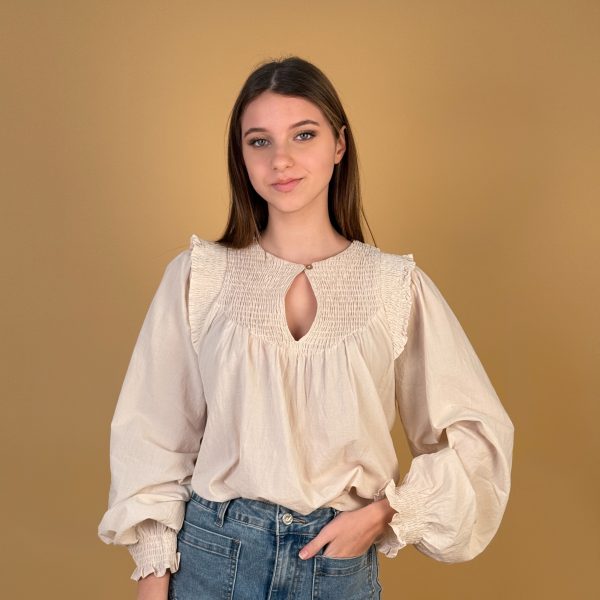 Blusa efecto nido de abeja